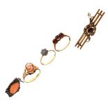 Bar brooch set seed pearls and garnet coloured stones, stamped 9ct, three dress rings and a cameo