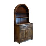 Reproduction oak canopy high dresser, the upper stage of typical arched form with wavy valance
