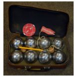 Cased set of eight French metal boules by Obut with markers and scorer Condition: