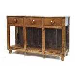 Early 19th Century oak low potboard dresser, the rectangular top over three frieze drawers on square