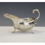 Edward VII silver sauce boat in the Georgian style on three lion mask ball feet, Birmingham 1907,