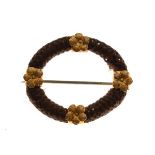 Victorian oval woven hair and flower design mourning brooch, the reverse engraved Edward Evershed