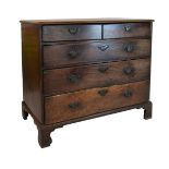 George III mahogany chest of two short over three graduated long drawers with brass escutcheons