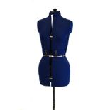 Tailor's dummy of adjustable design with blue fabric covering on tubular stand and tripod support