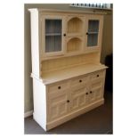 Cream painted pine high dresser or cabinet, the upper stage with a pair of glazed doors flanking