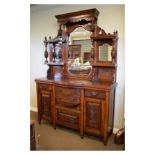 Late Victorian/Edwardian stained walnut mirror backed salon cabinet or sideboard, the upper stage