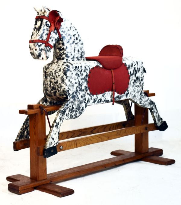 Child's painted wooden rocking horse with dappled decoration on pitch pine and oak sledge base