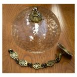 Early 20th Century Art & Crafts style dimpled glass ceiling light of hemispherical form and