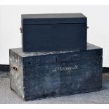 Two black painted wooden trunks, the larger early 20th Century named J.Stainer JR., the smaller