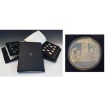 Set of 100 John Pinches silver medallions 'The 100 Greatest Inventions Of Mankind', 43oz approx in