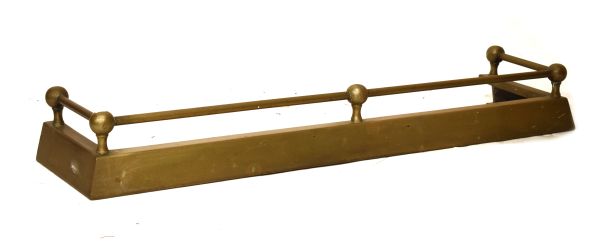 Brass fire kerb or fender with tubular rail on canted base Condition: