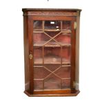 19th Century mahogany wall hanging corner display cabinet having a dentil cornice above a blind