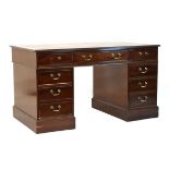 Reproduction mahogany twin pedestal desk, the rectangular top with gilt-tooled black Morocco