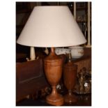 Treen - Two turned wooden urn shaped table lamp bases, one with shade Condition: