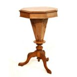 Victorian pollard oak work table, the figured hinged octagonal top enclosing a silk lined interior