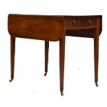 Early 19th Century mahogany Pembroke table, the rounded oblong flaps over short frieze drawer with