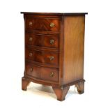 Reproduction mahogany serpentine fronted chest of four drawers Condition: