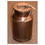 Small copper milk churn and cover, 36cm high exclusive of swing handle Condition: