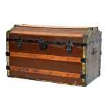 Early 20th Century dome-topped canvas trunk with wooden strips and metal mounts Condition: