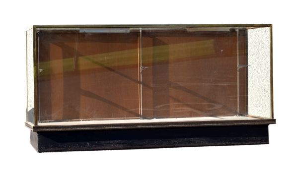 Mid 20th Century shop display cabinet or vitrine with bronze edges, plaque of Hickman Shopfitters