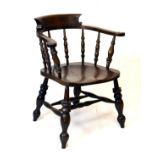 Late 19th Century elm and beech Smokers bow elbow chair standing on splayed turned supports united