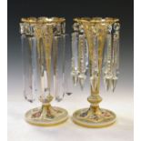 Pair of 19th Century Bohemian gilt decorated overlaid clear glass lustre drop vases, each with