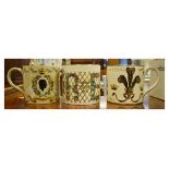 Three Wedgwood Royal Commemorative mugs designed by Richard Guyatt and comprising: Investiture of