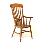 Late 19th Century elm and beech lath back Windsor style elbow chair standing on turned supports