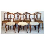 Set of four Victorian carved walnut dining chairs, a pair of balloon back chairs and a similar chair
