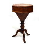 Victorian style oak hexagonal topped work table standing on a turned pillar and tripod base