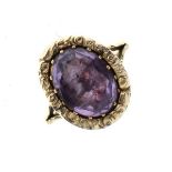 Yellow metal dress ring set oval amethyst-coloured stone, the shank stamped 9ct, size K½, 4g