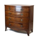 George III mahogany bow front chest of two short and three long drawers on spayed bracket feet