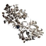 Six assorted silver and white metal charm bracelets with numerous novelty charms, 12ozt approx gross