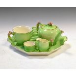 Royal Winton breakfast set for one being green glazed and having moulded floral decoration,