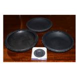 Pair of Wedgwood black basalt shallow bowls, each having grapevine decoration in relief, together
