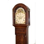 19th Century mahogany longcase clock, the hood with arched shaped cornice, glazed door within a