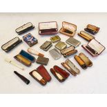 Various amber and other cigarette holders, vesta cases etc Condition: