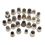 Collection of hallmarked silver and unmarked white metal thimbles Condition: