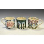 Two modern Wedgwood limited edition commemorative mugs designed by Richard Guyatt comprising: