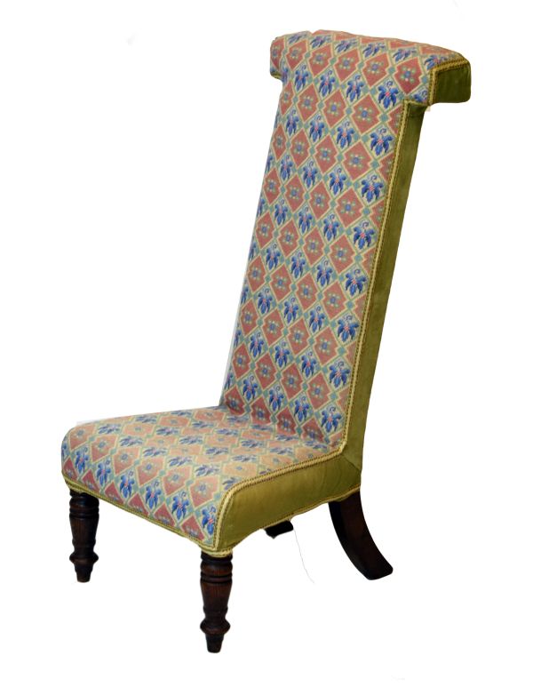 Victorian prie dieu chair upholstered in stylised floral pattern needlepoint and standing on front