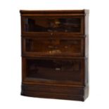 Oak Globe Wernicke three tier sectional bookcase having typical glazed up-and over doors Condition: