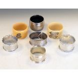 Five silver napkin rings, together with two silver mounted napkin rings, 3.3oz approx of weighable