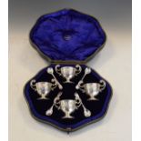 Set of four Edward VII silver two handled salts, each standing on a circular foot, London 1903, with