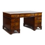 Reproduction mahogany finish double pedestal kneehole desk, fitted eight drawers with brass swan