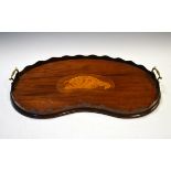 Edwardian mahogany two handled kidney shaped gallery tray having central inlaid conch shell