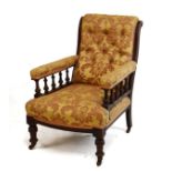 Edwardian oak framed drawing room chair upholstered in pink and cream floral patterned fabric and