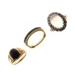 Three various rings comprising: unmarked yellow metal dress ring set central moonstone-coloured oval