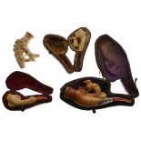 Four 19th Century carved meerschaum cheroot holders Condition: