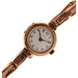 Lady's 9ct gold wristwatch, white Arabic dial with blue numeral 12, flexible strap, 20g approx gross