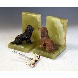 Pair of early 20th Century onyx bookends, each having cold painted bronze figural decoration